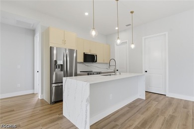 Experience luxury waterfront living in this brand-new - photo 9