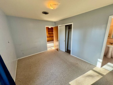 This 4-bedroom, 2-bathroom home, situated on a hilltop, offers