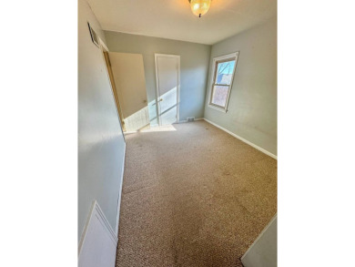 This 4-bedroom, 2-bathroom home, situated on a hilltop, offers