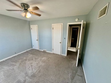 This 4-bedroom, 2-bathroom home, situated on a hilltop, offers