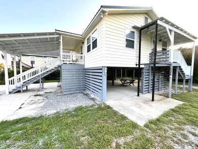 Beautiful coastal home just minutes walk away from the sandy - photo 2