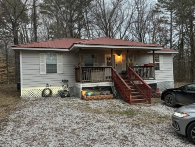 Lake Home For Sale in Hickory Flat, Mississippi