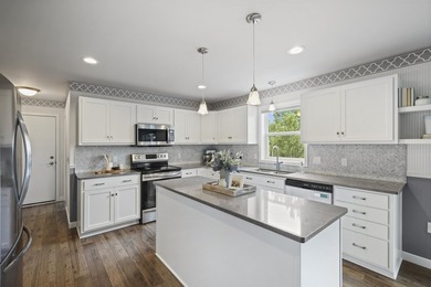 This beautifully maintained two-story home welcomes you with an - photo 2