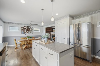 This beautifully maintained two-story home welcomes you with an - photo 3