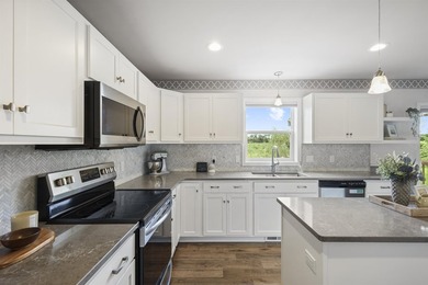 This beautifully maintained two-story home welcomes you with an - photo 5