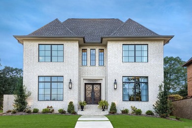 Tucked inside the prestigious gated golf course community of - photo 1
