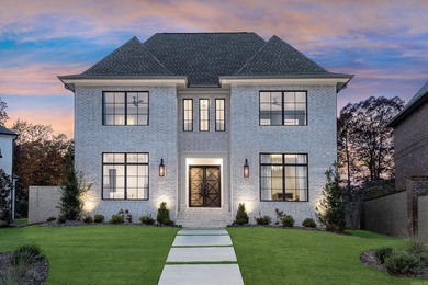 Tucked inside the prestigious gated golf course community of - photo 2