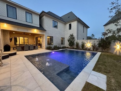 Tucked inside the prestigious gated golf course community of - photo 3
