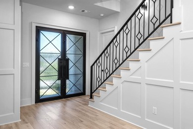 Tucked inside the prestigious gated golf course community of - photo 4