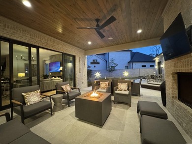 Tucked inside the prestigious gated golf course community of - photo 7