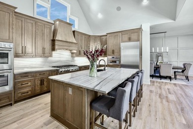 Tucked inside the prestigious gated golf course community of - photo 10