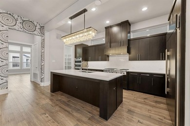 Just steps away from Legacy West! This contemporary home offers