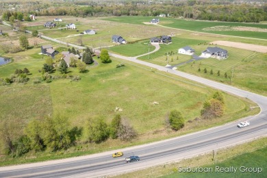 Lake Acreage For Sale in Ada, Michigan