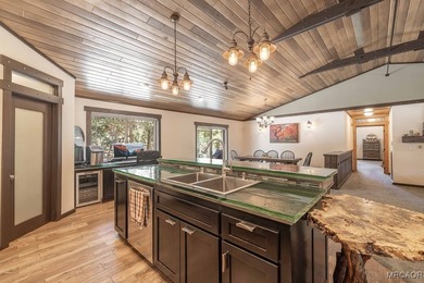 This breathtaking custom Craftsman home is tucked away on a - photo 14