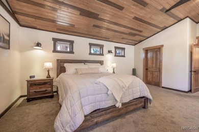 This breathtaking custom Craftsman home is tucked away on a - photo 19