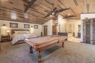 This breathtaking custom Craftsman home is tucked away on a - photo 20