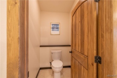 This breathtaking custom Craftsman home is tucked away on a - photo 23