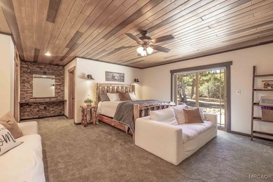 This breathtaking custom Craftsman home is tucked away on a - photo 24