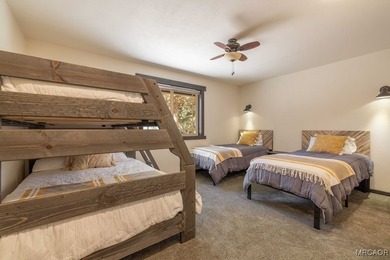 This breathtaking custom Craftsman home is tucked away on a - photo 30
