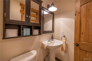 This breathtaking custom Craftsman home is tucked away on a - photo 34