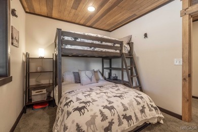 This breathtaking custom Craftsman home is tucked away on a - photo 36