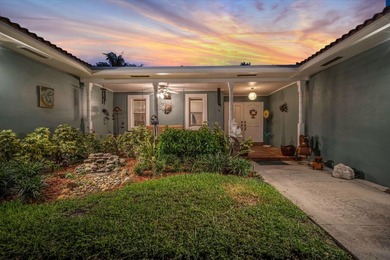 Welcome to this charming 4-bedroom 2-bath home situated in the - photo 3