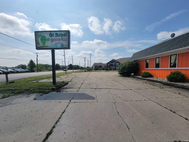 This commercial property features a vacant restaurant space full