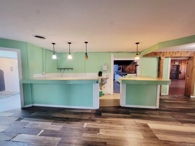 This commercial property features a vacant restaurant space full