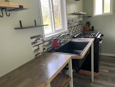 Come home to this newly built home with four bedrooms and two - photo 5