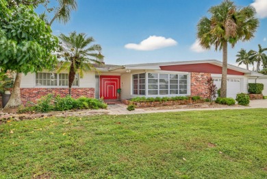 Lake Home For Sale in Lehigh Acres, Florida