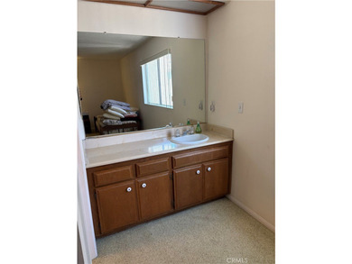 Charming tri-level townhome in Signal Hill featuring 2 bedrooms - photo 15