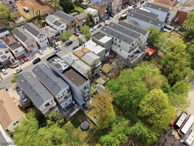 Welcome to 143 Terrace Ave, a rare 3-family opportunity in the - photo 5