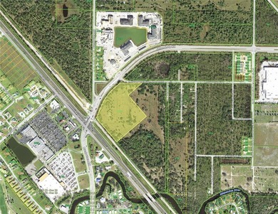 Introducing an exceptional +-12-acre Highway Commercial-zoned - photo 3