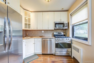 Welcome to this spacious 3-bedroom, 1-bath lower-level corner - photo 7