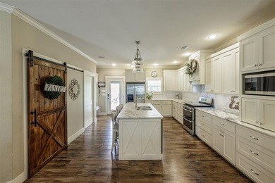 Experience luxury lake living in this stunning custom built - photo 11