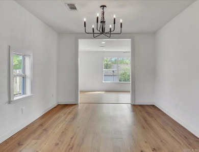 Wow! Check out this stunning 3-bedroom, 2-bath home in town that