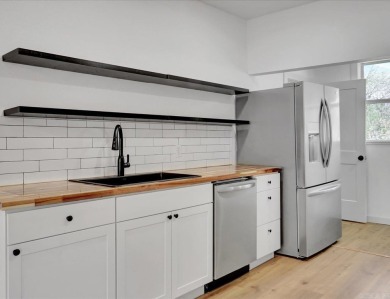 Wow! Check out this stunning 3-bedroom, 2-bath home in town that