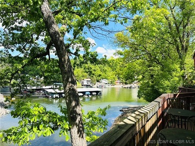 Affordable lakefront living at the 2 MM! This 2 bedroom, 1