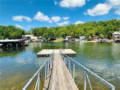 Affordable lakefront living at the 2 MM! This 2 bedroom, 1