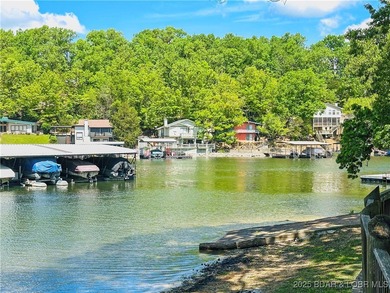 Affordable lakefront living at the 2 MM! This 2 bedroom, 1