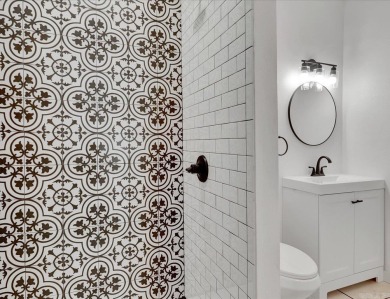 Wow! Check out this stunning 3-bedroom, 2-bath home in town that