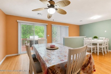 Welcome home to this exceptional two-family residence nestled in - photo 11