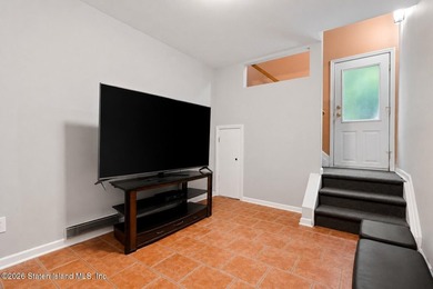 Welcome home to this exceptional two-family residence nestled in - photo 14