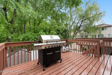 Welcome home to this exceptional two-family residence nestled in - photo 22
