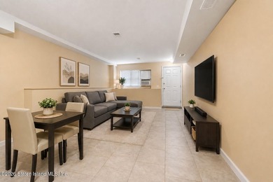 Welcome home to this exceptional two-family residence nestled in - photo 31