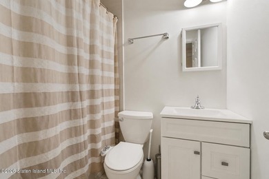 Welcome home to this exceptional two-family residence nestled in - photo 33