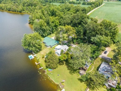 Grab your swimsuit and get ready to snatch this cutie up for - Lake Home For Sale in Lagrange, Indiana