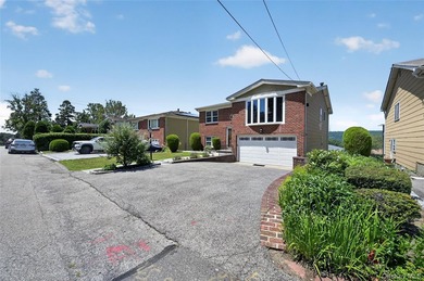 Located on a lovely, quiet street in Northwest Yonkers, this - photo 3