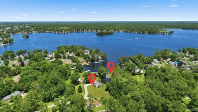 Built by the renowned Miller Brothers, this spacious waterfront - photo 2