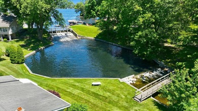 Built by the renowned Miller Brothers, this spacious waterfront - photo 5